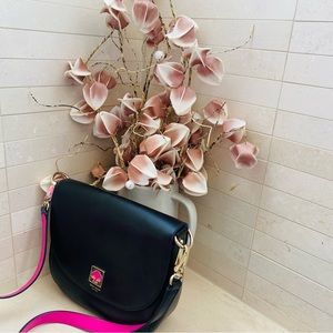 Kate Spade. Black and pink shoulder bag. Leather. Never worn but was in storage